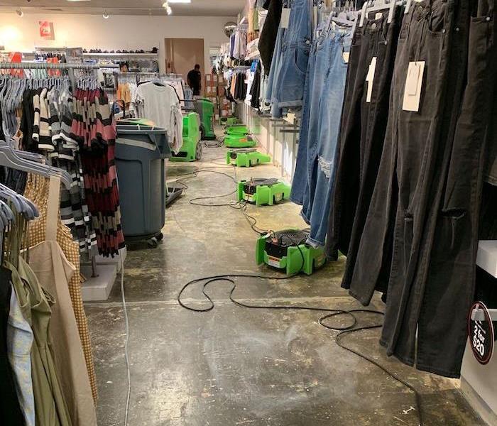 Retail clothing store with SERVPRO drying equipment