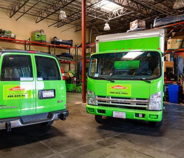 SERVPRO vehicles loading up with equipment in warehouse